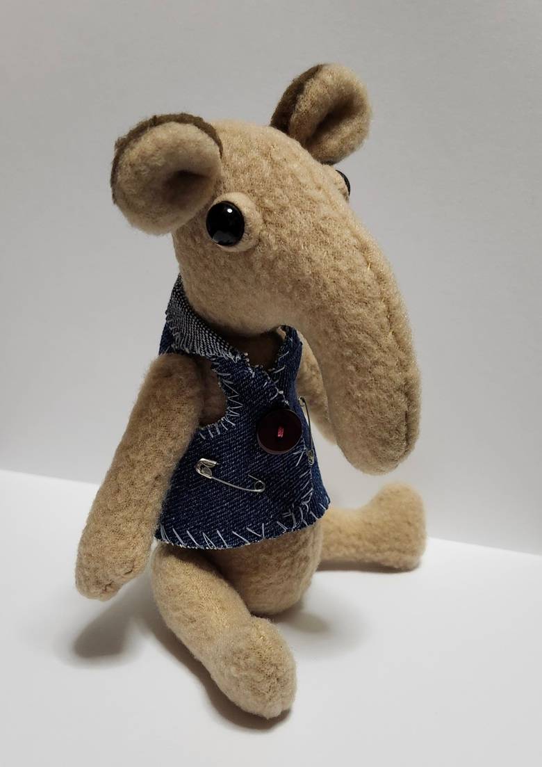 Long Nose Creature Plush with Cool Denim Vest